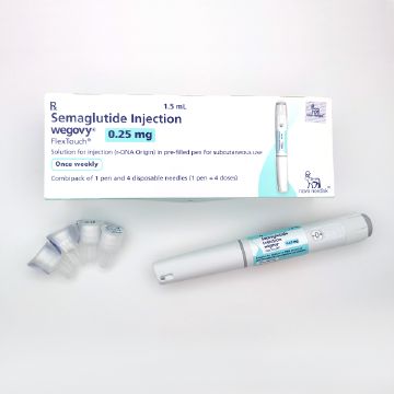 ウゴービ0.25mgの箱とペンと注射針